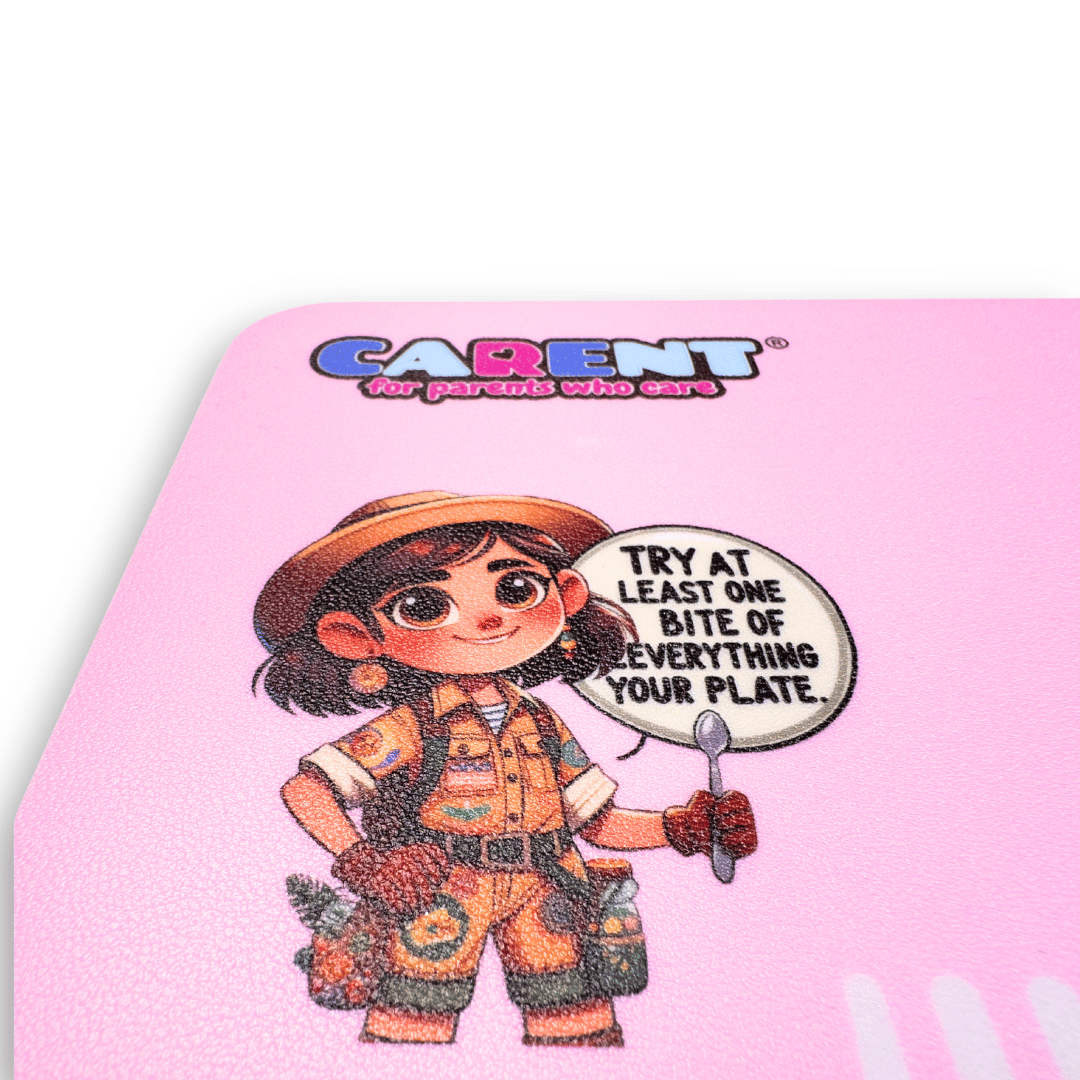 Safari-themed MealMate Grow placemat for girls aged 5-9, designed to teach table manners and encourage adventurous eating. The placemat features fun challenges like ‘Try at least one bite of everything on your plate,’ guiding children with interactive visual cues. Made from durable, easy-to-clean silicone and includes educational QR codes for extended learning. close up of illustration with speak bubble saying "Try at least one bite o" everything on your plate"